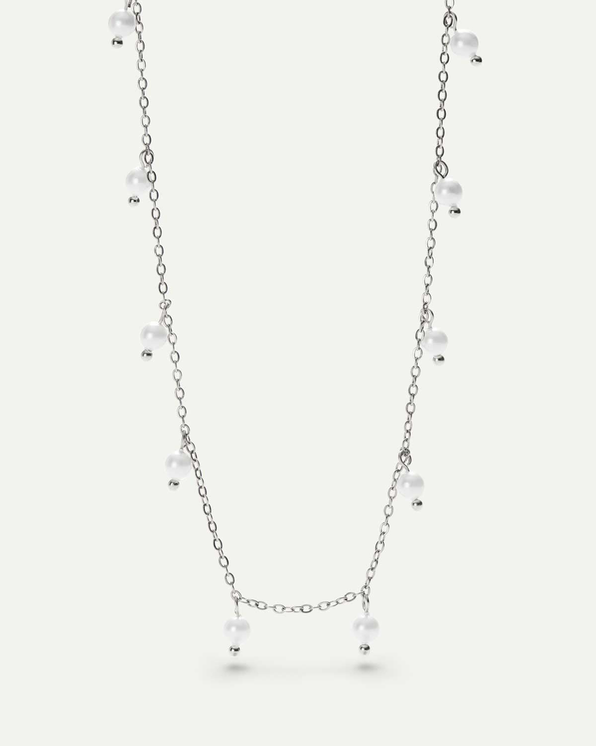 Necklace with silver plated chain and small pearl pendants