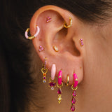 FUCHSIA GOLD FACE EARRINGS