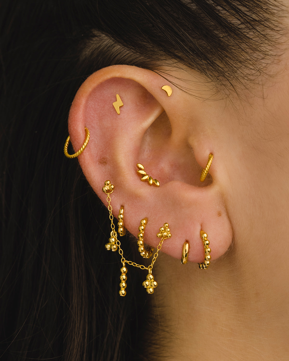 PIERCING LOOP M TWIST GOLD EARRING