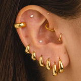 URA L SILVER EARRINGS