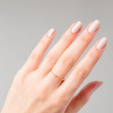 Hand with Carolina Gold ring with white zirconia stone