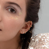 Model posing with Elvira 925 Sterling Silver Gold Plated Earrings with White Zirconias