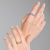 Hands with Sapphire Blue Gold rings