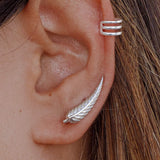 Ear with Soft Silver earring and another silver earring from Adamina's collection.