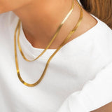 Photo detail of woman with Yoko necklaces. Adamina