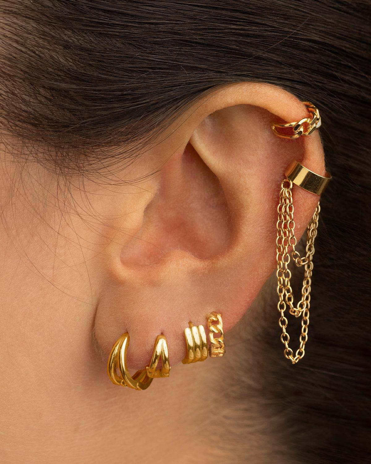 BOUCLES D'OREILLES EN OR AVEC CHAÎNE À ARCEAUX