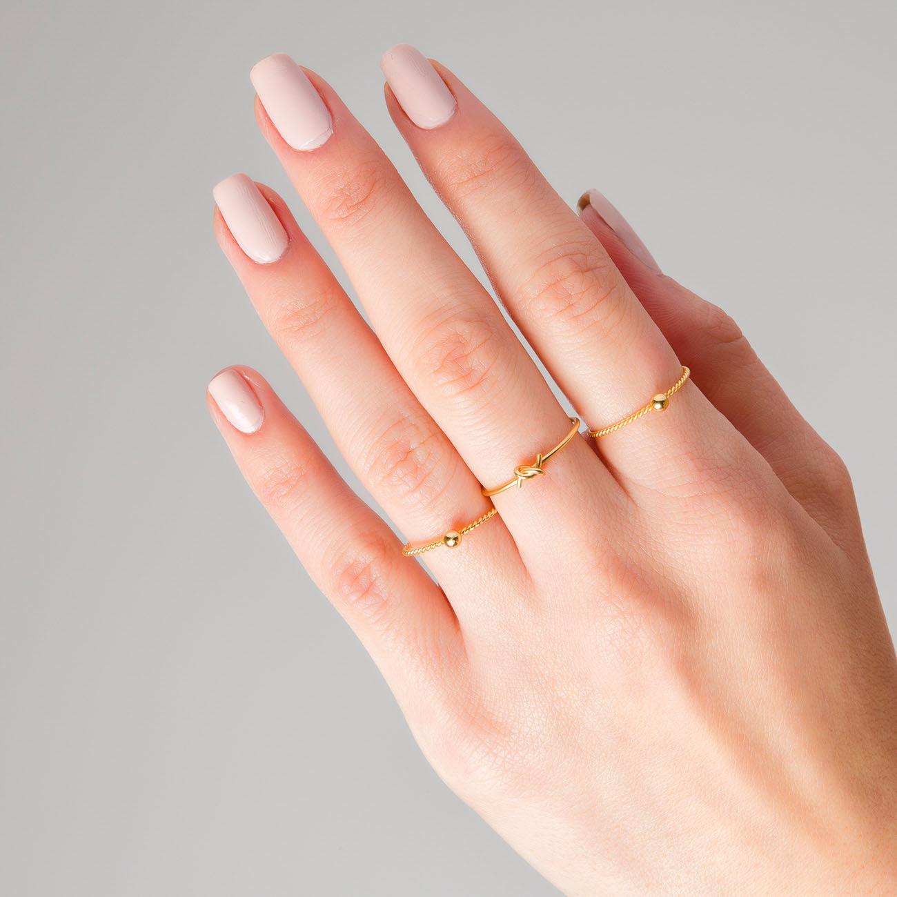 ANELLO CON PUNTI IN ORO ROSA