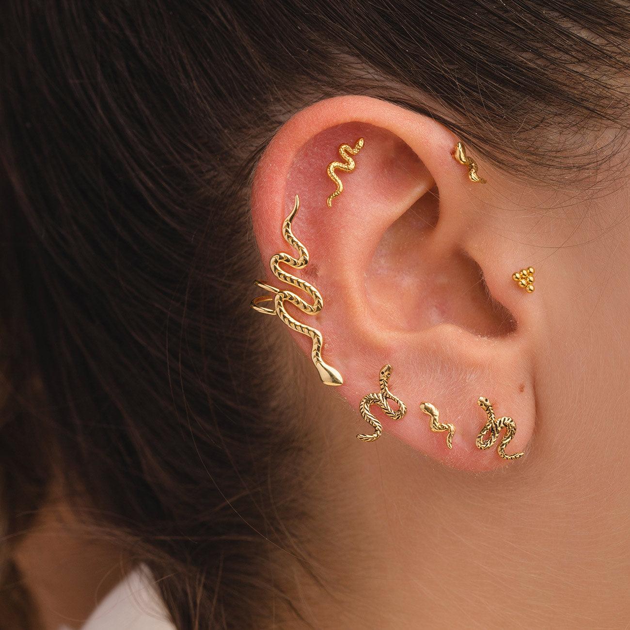 PIERCING SERPENTE ORO